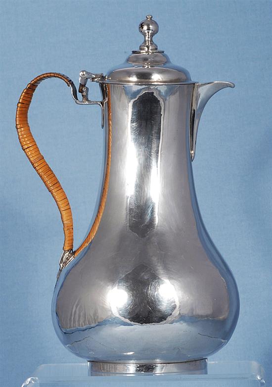 An Irish George III silver hot water pot, maker probably William Thompson, Height: 239mm gross weight: 14.7oz/460grms